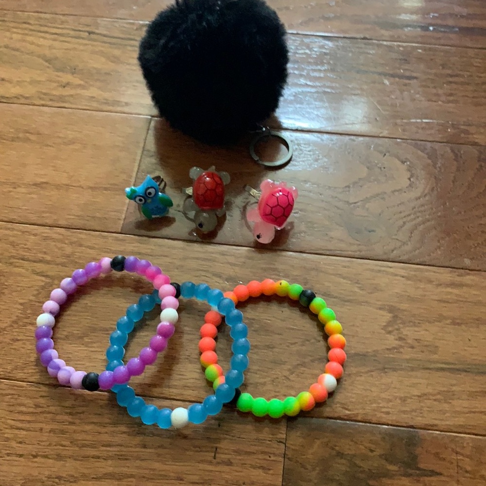 Lot of rings, bracelets and fluff ball keychain